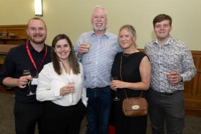 group of six people smiling for picture
